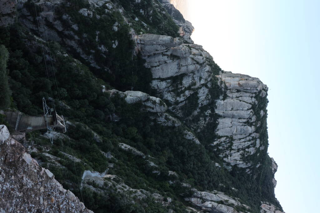 Down there is a path I walked up here. In the foreground, the cable car mast is surprisingly low, from this view.