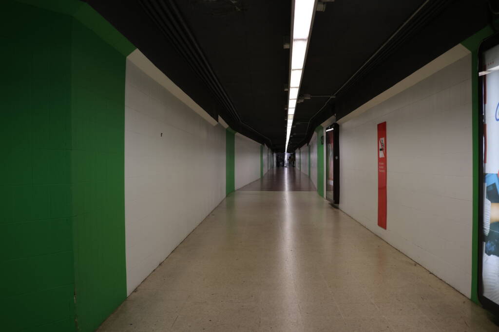 A long transfer corridor in the metro.