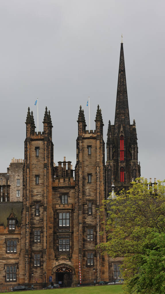 New College, the dark tower in backgroud is a former neo-gothic church; now The Hub, an information centre, performance venue and a café.