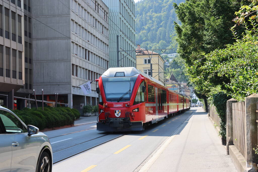 The train rides along the street partly like a tram. It has a rear cab as well so that the engine doesn't need to run around.