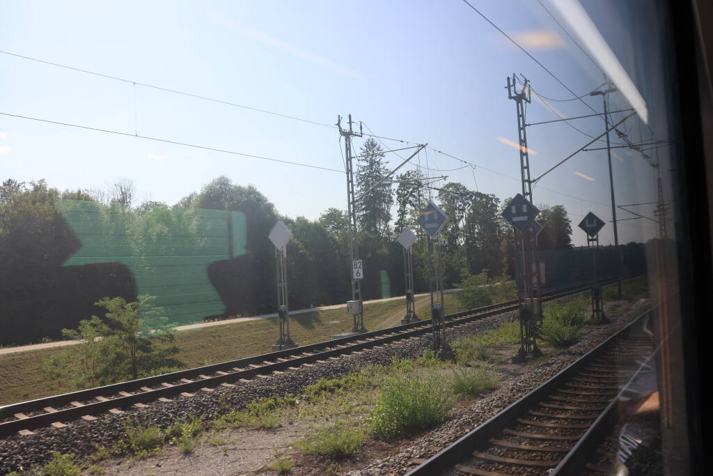 Finally in the right train. The signs are alerting about creepers in this area.