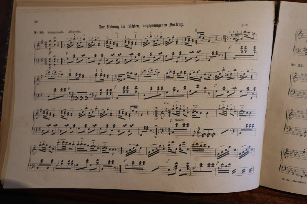 One of the pianos had some sheet music there. This looks playable.