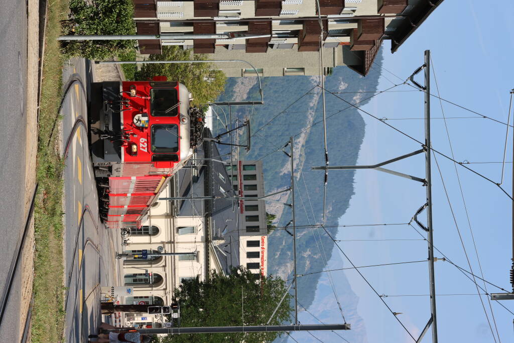 Train to Arosa operated by Rhätische Bahn has just departed from the Chur station. 1000 mm, 11 kV, 16.7 Hz