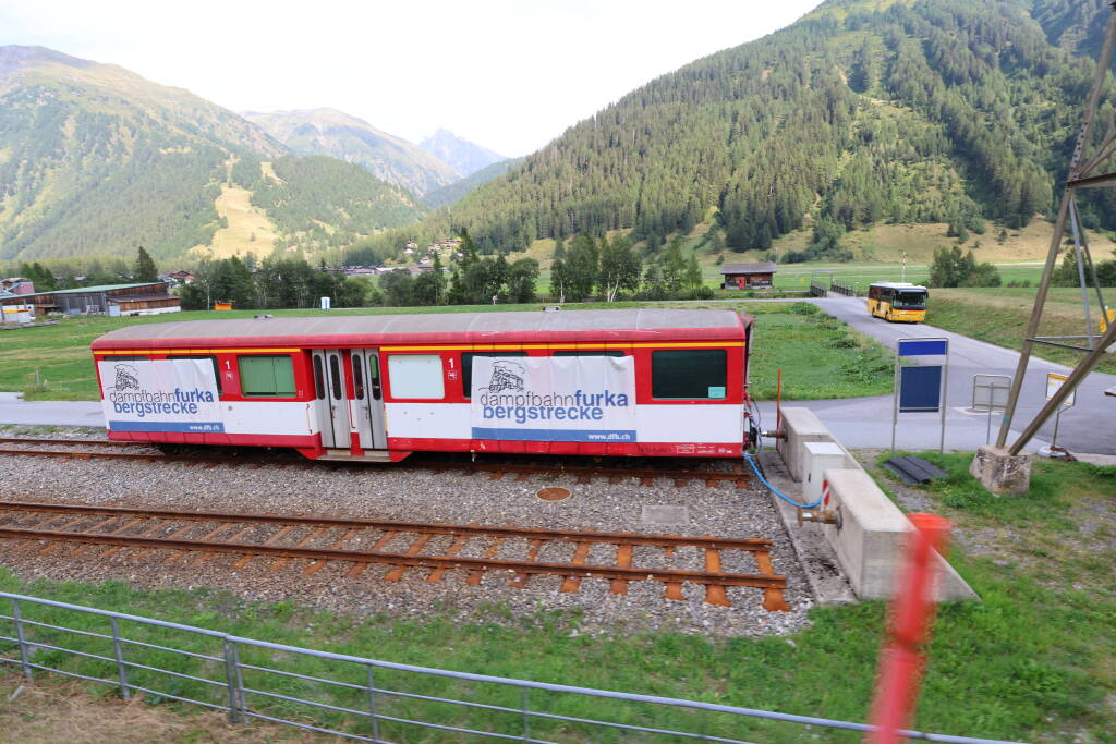 A parked wagon of the heritage steam railway over the Furka pass. The basis tunnel is single-track but 15km long, therefore it has two sidings for train passing – which are commonly used.