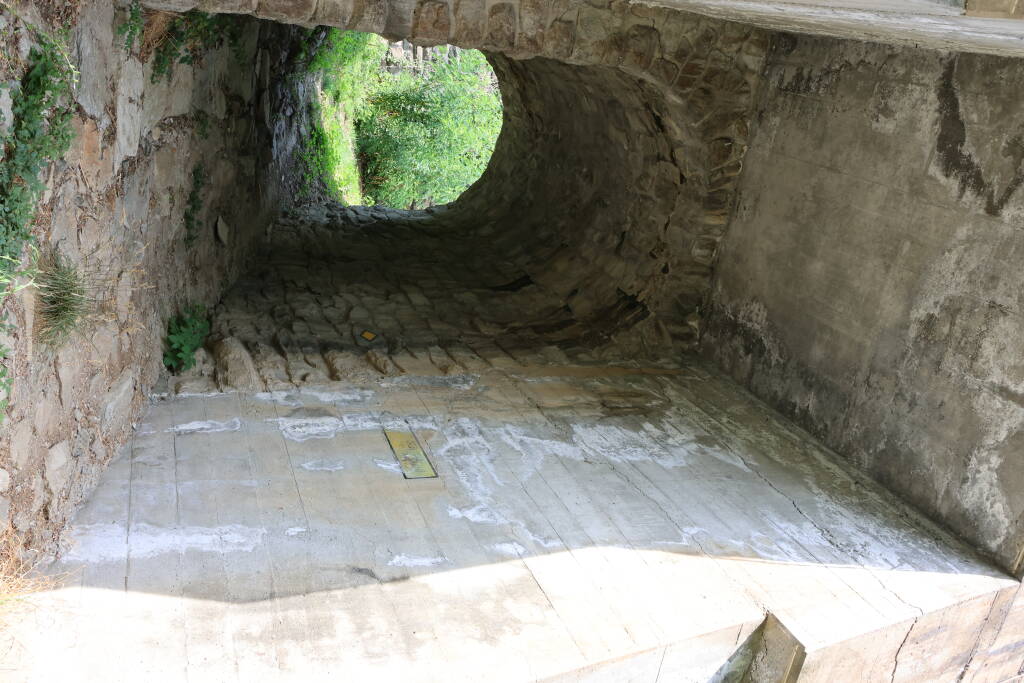 The railway was originally single-track and they didn't bother much with adding the second track.