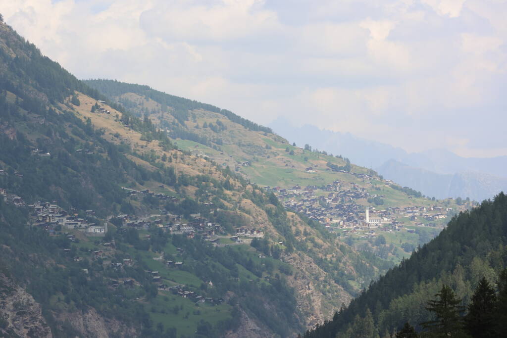 Village view. On the left side above the gorge, there is Embd. In the background Törbel with church of Theodor the saint.