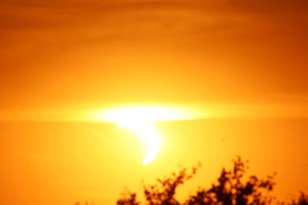 Aiming at the sun was absurdly difficult and it was a work of two people.